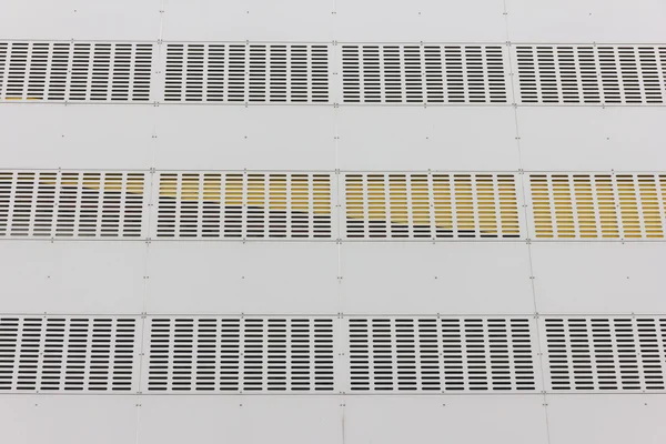 Fachada perforada de un edificio industrial —  Fotos de Stock