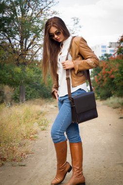 Autumn fashion image of young woman