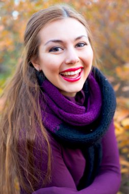 Close up autumn portrait of young woman
