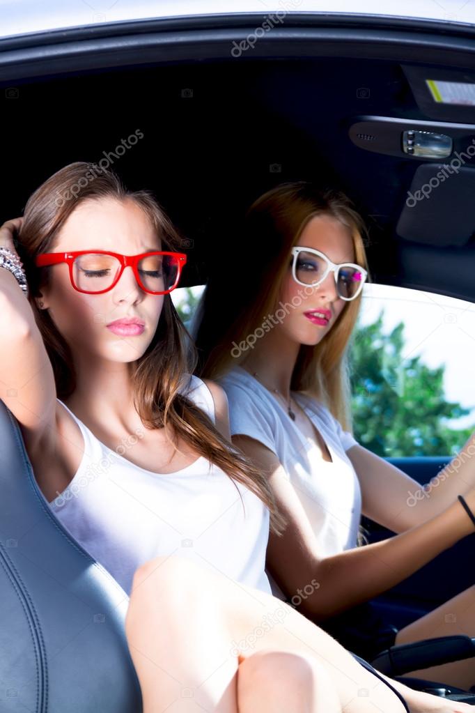 Two girls in the car.