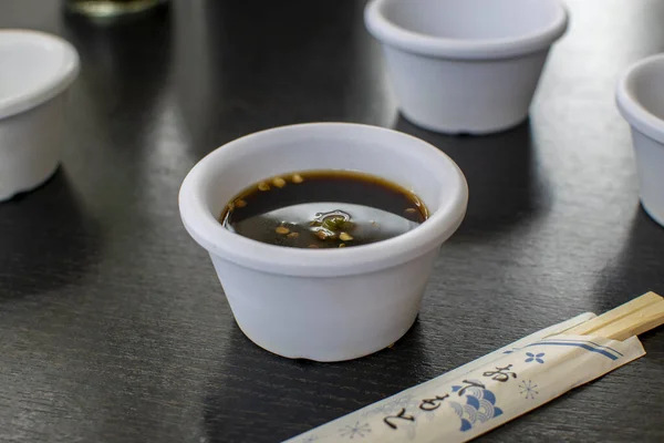 Dark Soy Chinese Sauce Black Table Chopsticks White Cups — Stock Photo, Image
