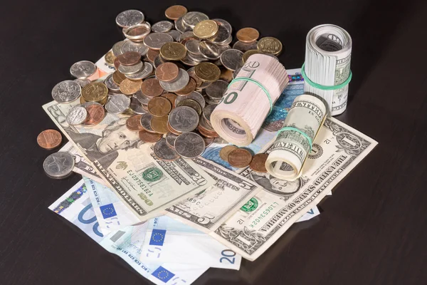 Dollars en euro op een tafel Rechtenvrije Stockafbeeldingen