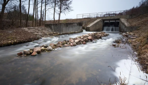 Long exposure photo of dam on river. — Stock Photo, Image