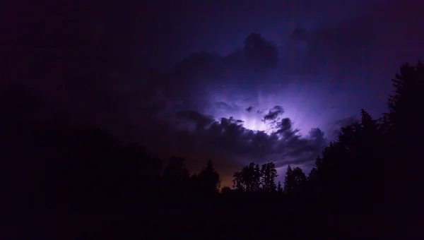 Landscape with lightning at stormy night — Stock Photo, Image