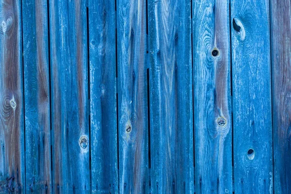 Muur gemaakt met houten planken. Blauw gekleurd. — Stockfoto