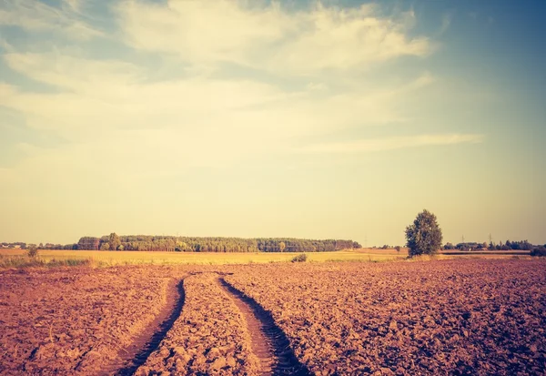 Vintage foto van geploegd veld landschap — Stockfoto