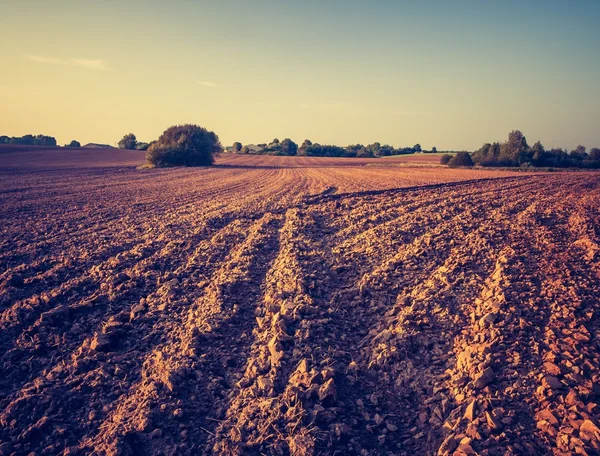 Vintage photo of plowed field landscape — Stock Photo, Image