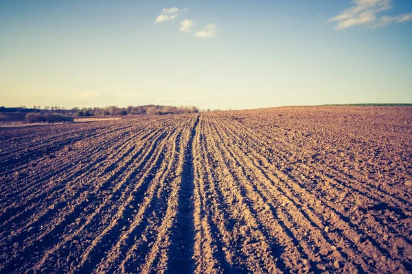 Vintage photo of plowed field — Stock Photo, Image
