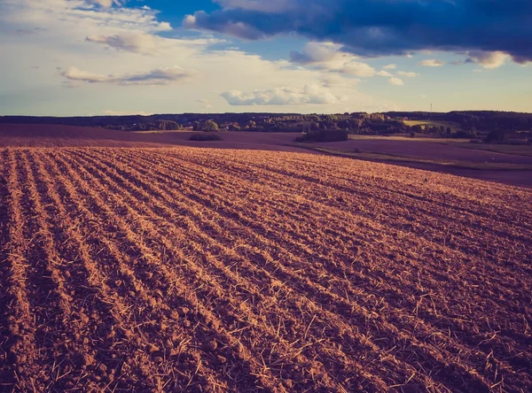 Vintage photo of plowed field — Stock Photo, Image