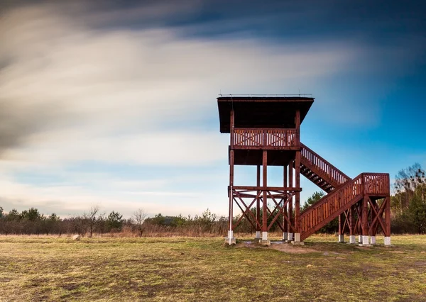 Landscape with big watching tower. Long exposure photo. — Stock Photo, Image