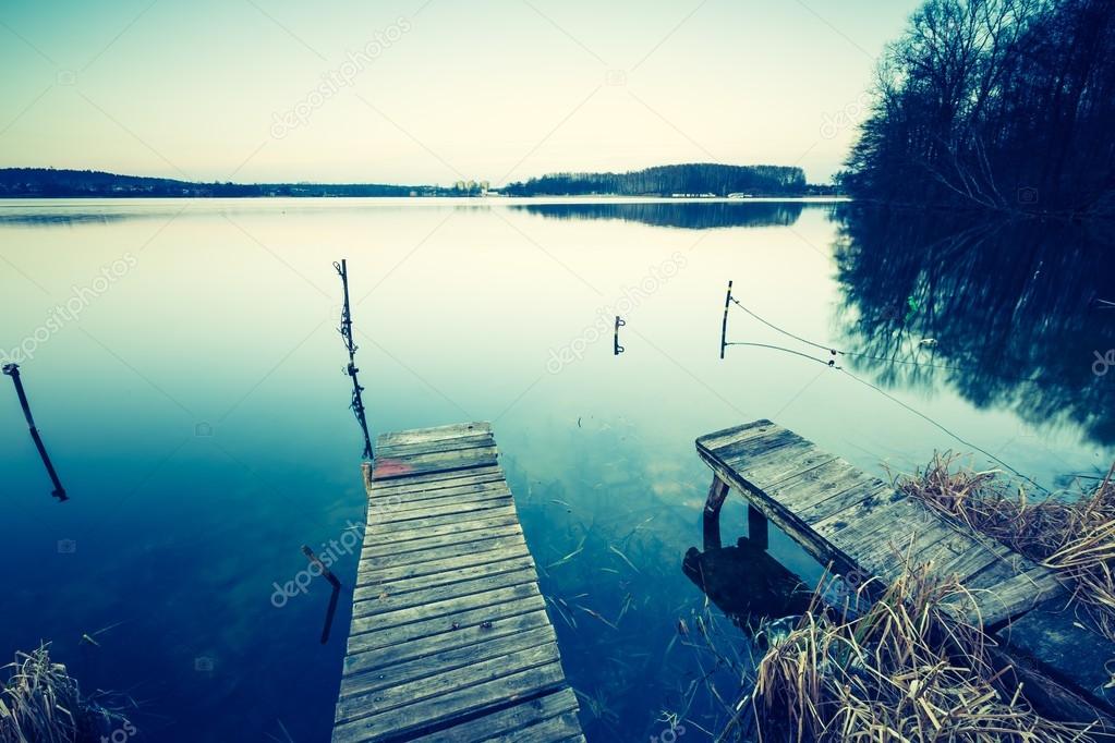 Vintage photo of polish lake at sunset