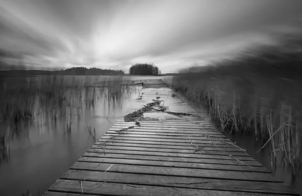 Lake with jetty. long exposure landscape — Stock Photo, Image