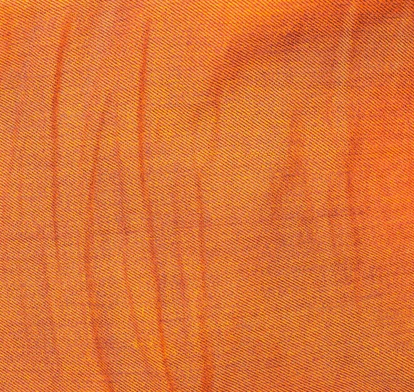 橙色的牛仔裤纺织 — 图库照片