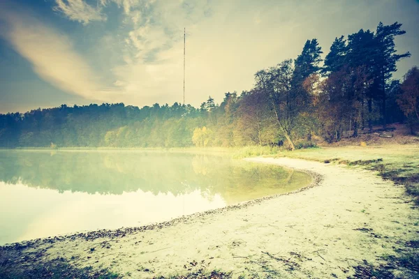 Sunset over calm lake — Stock Photo, Image