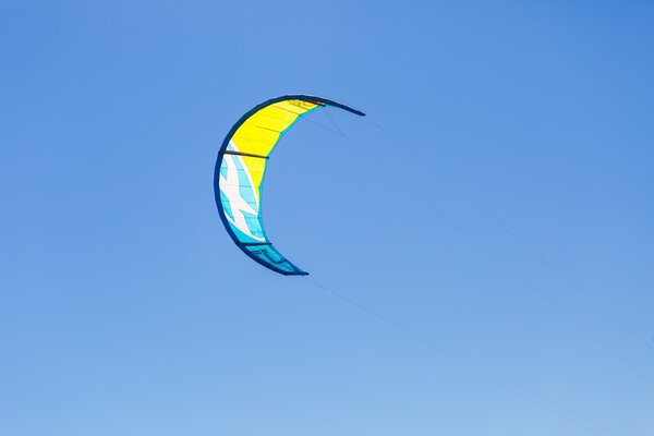 kitesurfer on sea surface