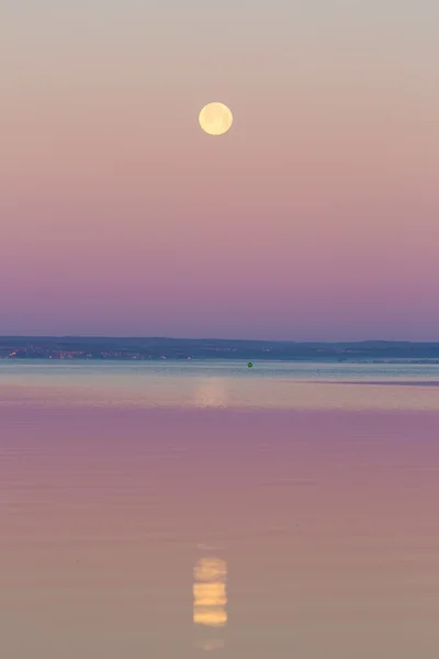 Moon setting over sea. — Stock Photo, Image