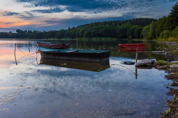 Sunset with fisherman boats — Stock Photo, Image