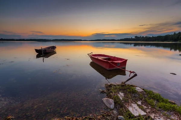 Sunset with fisherman boats — Stock Photo, Image