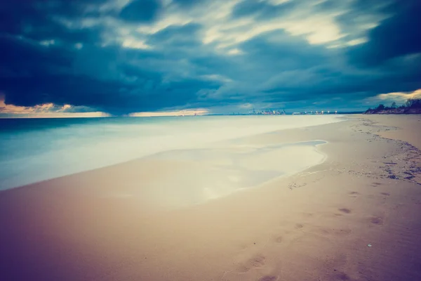 Vintage photo of beautiful long exposure landscape of sea shore — Stock Photo, Image