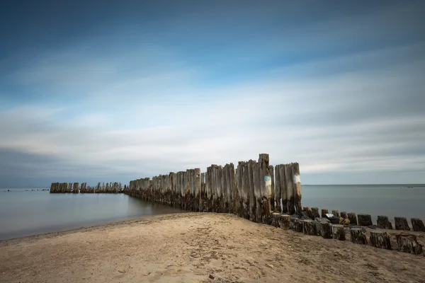 Beach with old military buildings — Stock Photo, Image