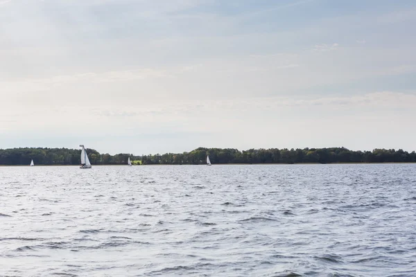 Lake landscape with yachts — Stock Photo, Image