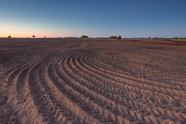 Beautiful landscape with plowed field under sky — Stock Photo, Image