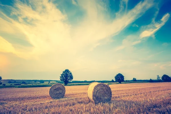 Photo vintage de champ de chaume avec des balles — Photo