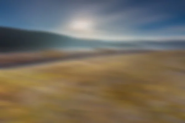 Verschwommene abstrakte Landschaft aus Feldern — Stockfoto