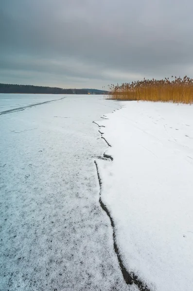 Winter frozen lake landscape.