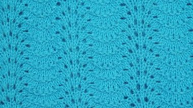 Doğal yün kumaş, süveter parçası. Tekstil dokusu turkuaz arkaplan