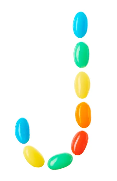 J carta feita de doces multicoloridos isolados em branco — Fotografia de Stock