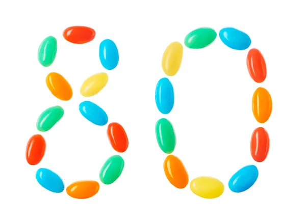80 Zahl aus bunten Bonbons isoliert auf weiß — Stockfoto