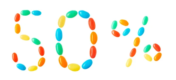 50% de letras feitas de doces multicoloridos isolados em branco — Fotografia de Stock