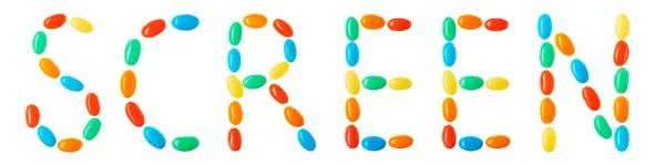 Screen lettering made of multicolored candies — Stock Photo, Image