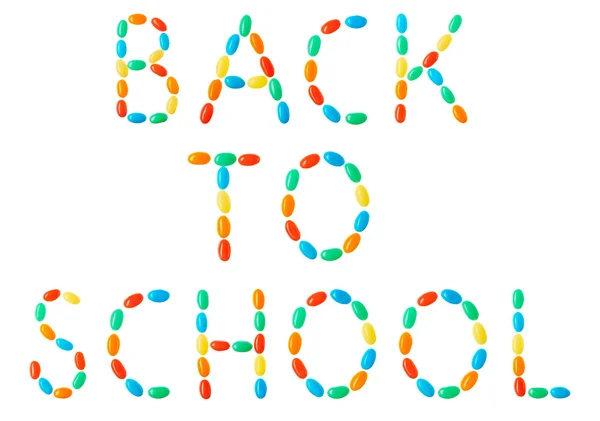 Voltar para a escola letras feitas de doces multicoloridos — Fotografia de Stock
