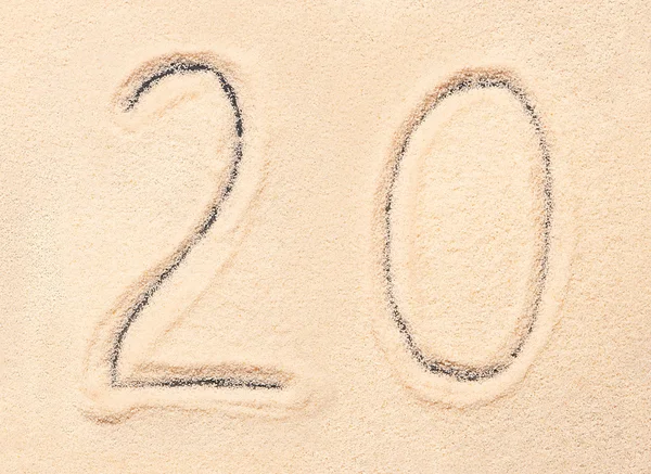 20 Ziffern auf Sand geschrieben — Stockfoto