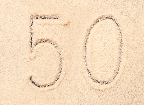 50 počet písemných na pláži písek — Stock fotografie
