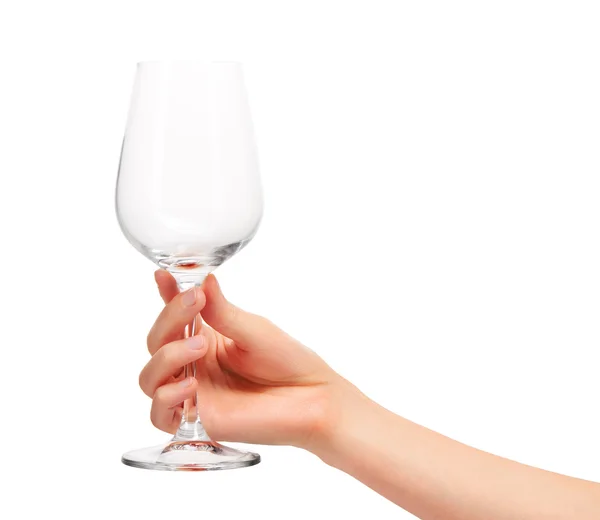 Mano femenina sosteniendo copa de vino vacía contra blanco —  Fotos de Stock