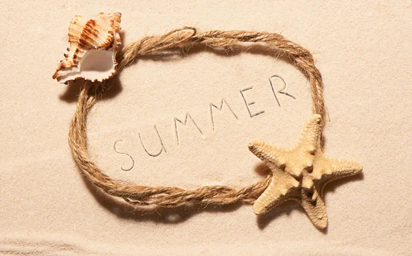 Frame with starfish, empty seashell and summer on sand — Stock Photo, Image