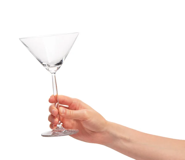 Boş temiz şeffaf martini cam tutan el 