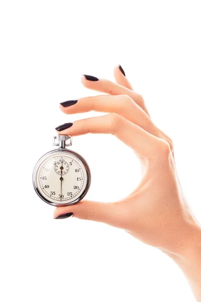 Women's hand with stopwatch, nails covered with aubergine nail polish — Stock Photo, Image