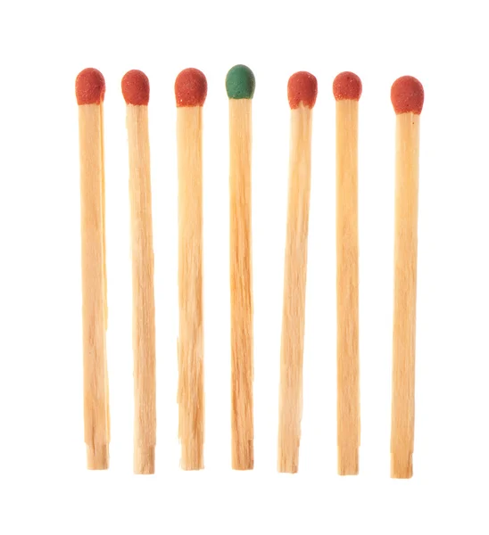 Set of six red and one green wooden matches — 图库照片