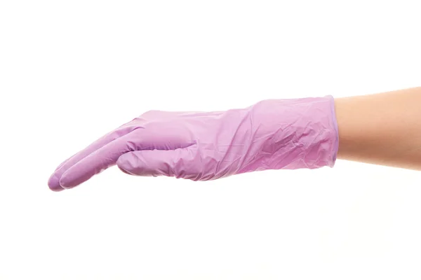 Female doctor's hand in purple sterilized surgical glove — 스톡 사진