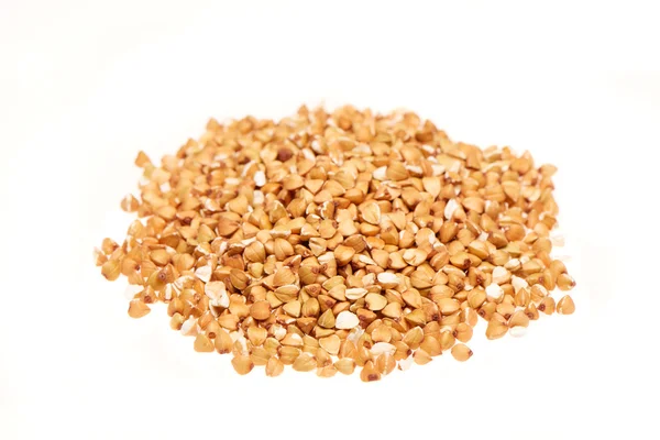Pile of buckwheat seeds isolated on the white background — Stock Photo, Image
