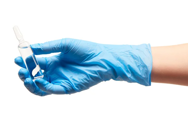 Close up of female doctor's hand in blue sterilized surgical glove holding glass ampoule with a drug — Stock Photo, Image