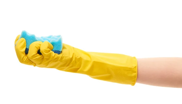 Mano femenina en guante protector amarillo con esponja de limpieza azul — Foto de Stock