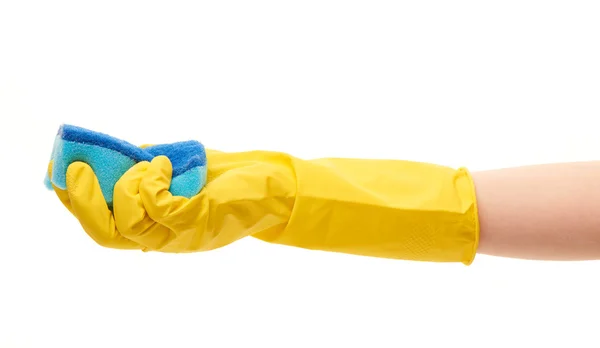 Mano femenina en guante protector amarillo con esponja de limpieza azul —  Fotos de Stock