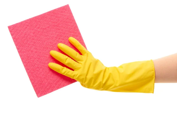 Female hand in yellow protective rubber glove holding pink rag — ストック写真