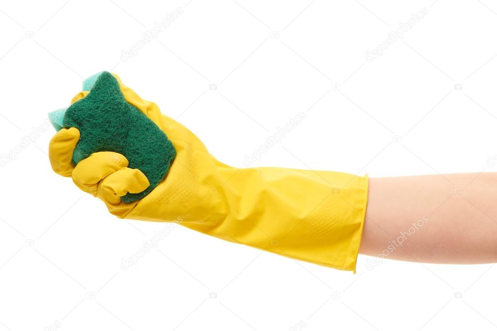 Female hand in yellow protective glove holding green cleaning sponge