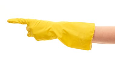 Female hand in yellow protective glove pointing on something against white